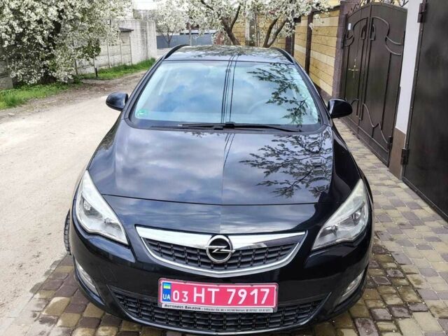 Черный Опель Астра, объемом двигателя 1.4 л и пробегом 195 тыс. км за 5900 $, фото 1 на Automoto.ua
