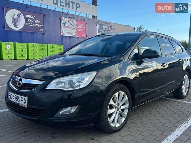 Черный Опель Астра, объемом двигателя 1.69 л и пробегом 290 тыс. км за 6900 $, фото 1 на Automoto.ua