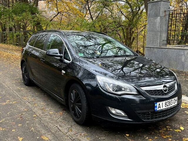 Черный Опель Астра, объемом двигателя 1.7 л и пробегом 275 тыс. км за 7400 $, фото 1 на Automoto.ua