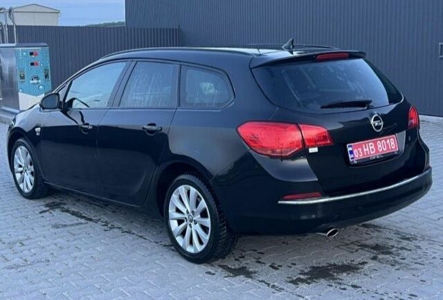 Черный Опель Астра, объемом двигателя 1.4 л и пробегом 275 тыс. км за 7500 $, фото 1 на Automoto.ua