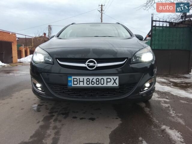 Черный Опель Астра, объемом двигателя 1.7 л и пробегом 310 тыс. км за 7500 $, фото 1 на Automoto.ua