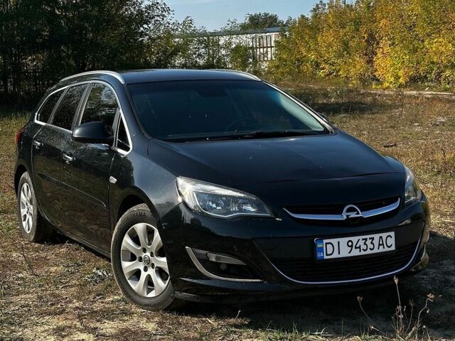 Черный Опель Астра, объемом двигателя 1.7 л и пробегом 309 тыс. км за 5600 $, фото 1 на Automoto.ua