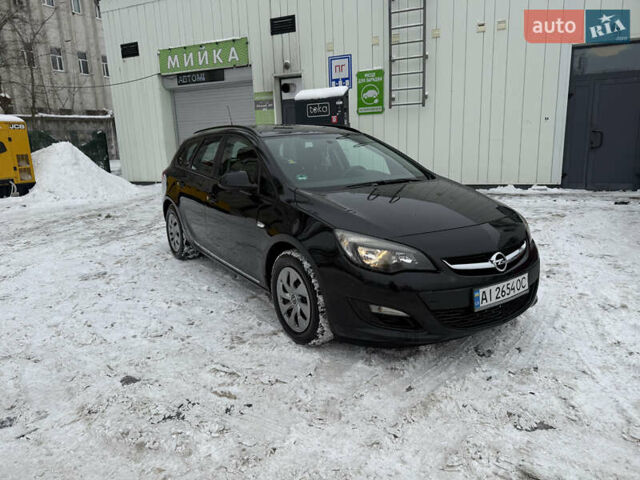 Черный Опель Астра, объемом двигателя 1.69 л и пробегом 255 тыс. км за 6600 $, фото 1 на Automoto.ua