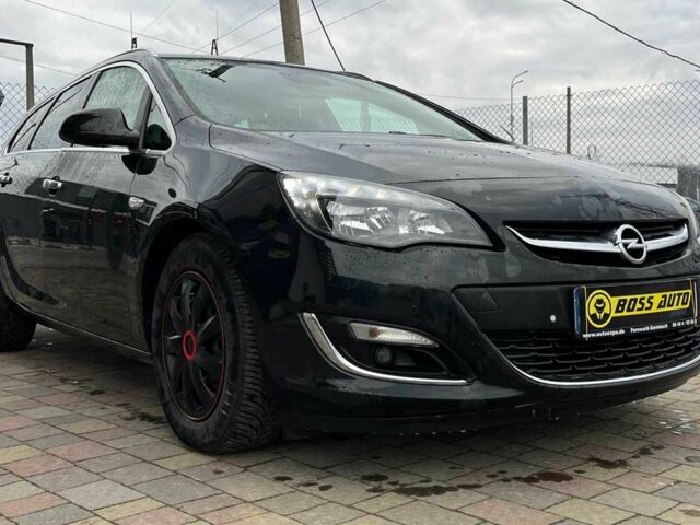 Черный Опель Астра, объемом двигателя 1.7 л и пробегом 285 тыс. км за 8700 $, фото 1 на Automoto.ua