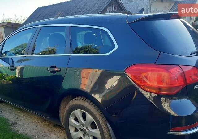 Черный Опель Астра, объемом двигателя 1.7 л и пробегом 310 тыс. км за 7500 $, фото 1 на Automoto.ua