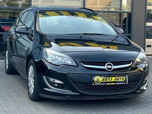 Черный Опель Астра, объемом двигателя 1.7 л и пробегом 216 тыс. км за 7800 $, фото 1 на Automoto.ua
