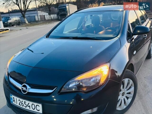 Черный Опель Астра, объемом двигателя 1.69 л и пробегом 255 тыс. км за 6750 $, фото 1 на Automoto.ua