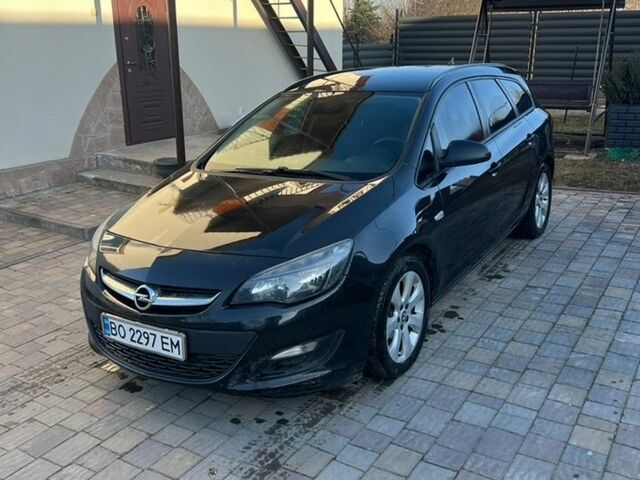 Черный Опель Астра, объемом двигателя 1.69 л и пробегом 325 тыс. км за 6200 $, фото 1 на Automoto.ua