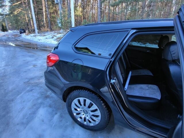 Черный Опель Астра, объемом двигателя 1.7 л и пробегом 225 тыс. км за 7600 $, фото 1 на Automoto.ua