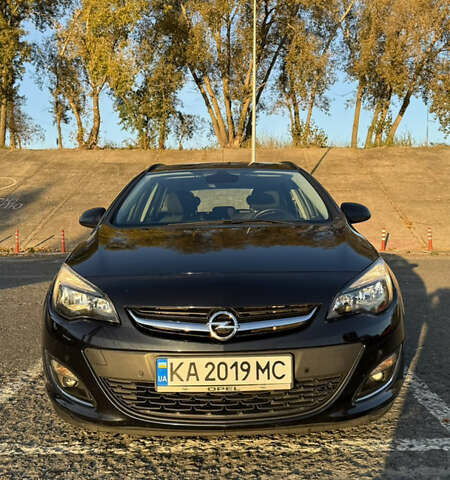 Черный Опель Астра, объемом двигателя 1.4 л и пробегом 211 тыс. км за 7500 $, фото 1 на Automoto.ua