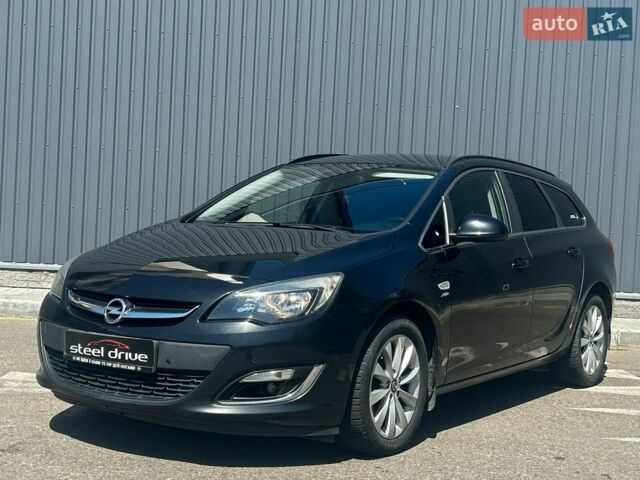 Черный Опель Астра, объемом двигателя 1.7 л и пробегом 278 тыс. км за 7899 $, фото 1 на Automoto.ua