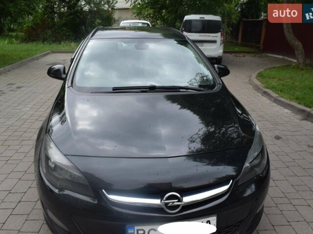 Черный Опель Астра, объемом двигателя 1.69 л и пробегом 222 тыс. км за 7500 $, фото 1 на Automoto.ua