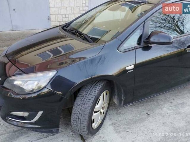 Опель Астра 2013 в Ивано-Франковске на Automoto.ua Черный Опель Астра, объемом двигателя 2 л и пробегом 210 тыс. км за 8900 $, фото 1 на Automoto.ua