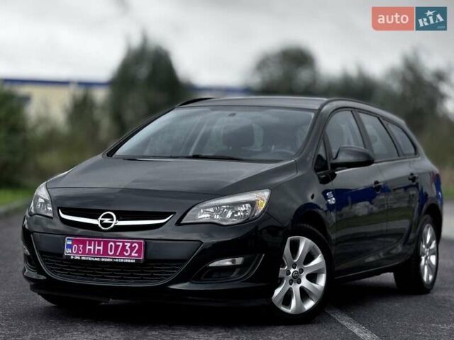 Черный Опель Астра, объемом двигателя 1.4 л и пробегом 158 тыс. км за 7400 $, фото 1 на Automoto.ua