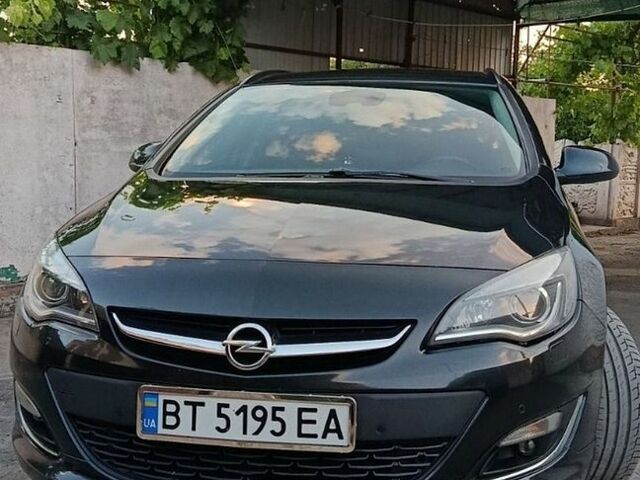 Черный Опель Астра, объемом двигателя 1.7 л и пробегом 254 тыс. км за 8300 $, фото 1 на Automoto.ua