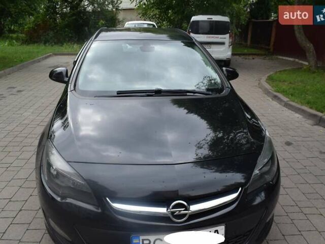 Черный Опель Астра, объемом двигателя 1.69 л и пробегом 222 тыс. км за 7500 $, фото 1 на Automoto.ua