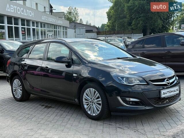 Черный Опель Астра, объемом двигателя 1.7 л и пробегом 260 тыс. км за 6800 $, фото 1 на Automoto.ua