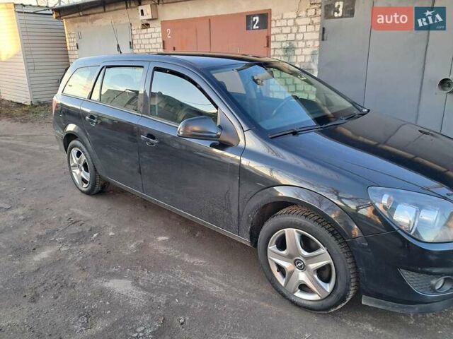 Черный Опель Астра, объемом двигателя 1.6 л и пробегом 318 тыс. км за 5400 $, фото 1 на Automoto.ua