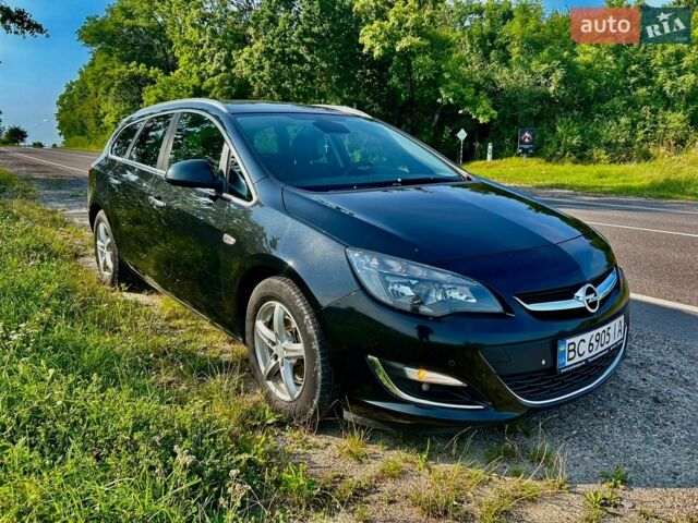 Черный Опель Астра, объемом двигателя 1.69 л и пробегом 288 тыс. км за 8000 $, фото 1 на Automoto.ua