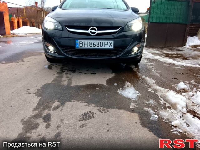 Черный Опель Астра, объемом двигателя 1.7 л и пробегом 305 тыс. км за 7500 $, фото 1 на Automoto.ua