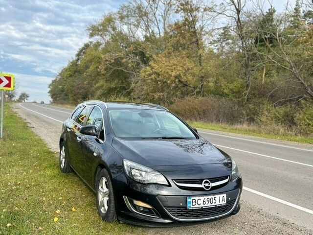 Черный Опель Астра, объемом двигателя 1.69 л и пробегом 293 тыс. км за 7500 $, фото 1 на Automoto.ua