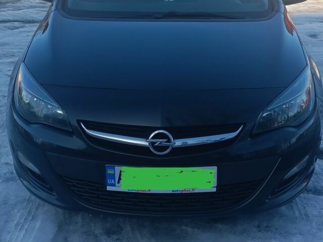 Черный Опель Астра, объемом двигателя 1.7 л и пробегом 245 тыс. км за 8000 $, фото 1 на Automoto.ua