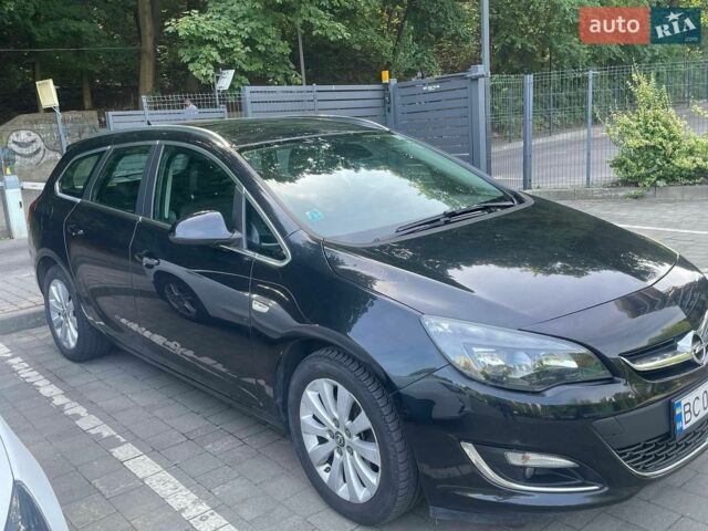 Черный Опель Астра, объемом двигателя 1.6 л и пробегом 156 тыс. км за 9600 $, фото 1 на Automoto.ua