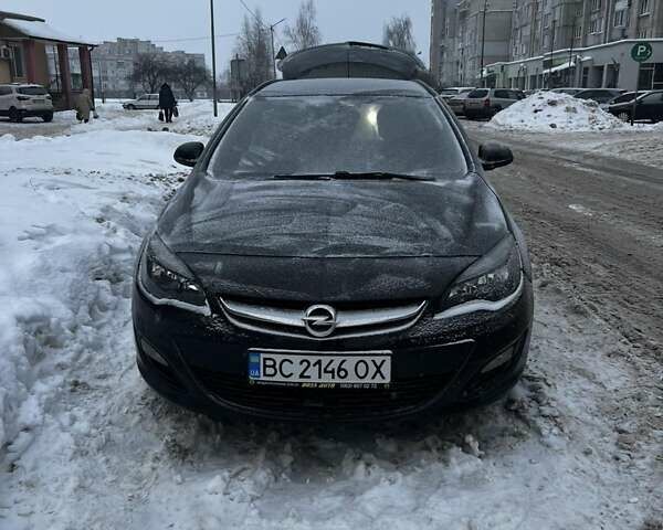 Черный Опель Астра, объемом двигателя 1.7 л и пробегом 195 тыс. км за 7700 $, фото 1 на Automoto.ua