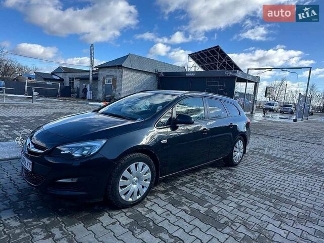 Черный Опель Астра, объемом двигателя 1.6 л и пробегом 225 тыс. км за 8000 $, фото 1 на Automoto.ua