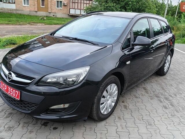 Черный Опель Астра, объемом двигателя 1.6 л и пробегом 206 тыс. км за 8000 $, фото 1 на Automoto.ua