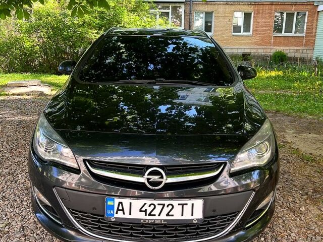 Черный Опель Астра, объемом двигателя 1.6 л и пробегом 290 тыс. км за 8250 $, фото 1 на Automoto.ua