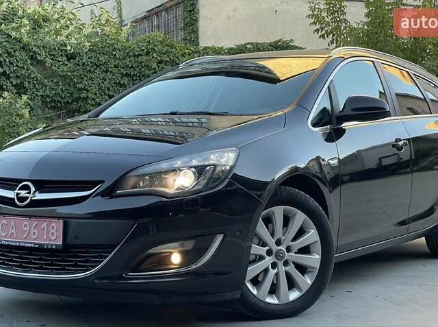 Черный Опель Астра, объемом двигателя 1.6 л и пробегом 292 тыс. км за 8950 $, фото 1 на Automoto.ua