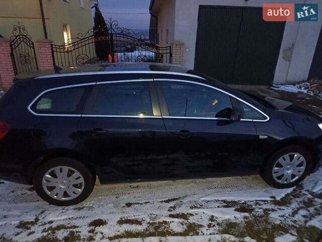 Черный Опель Астра, объемом двигателя 1.6 л и пробегом 280 тыс. км за 9700 $, фото 1 на Automoto.ua