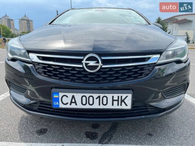 Черный Опель Астра, объемом двигателя 1.6 л и пробегом 201 тыс. км за 9800 $, фото 1 на Automoto.ua