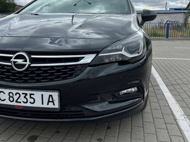 Чорний Опель Астра, об'ємом двигуна 1.6 л та пробігом 124 тис. км за 11550 $, фото 1 на Automoto.ua