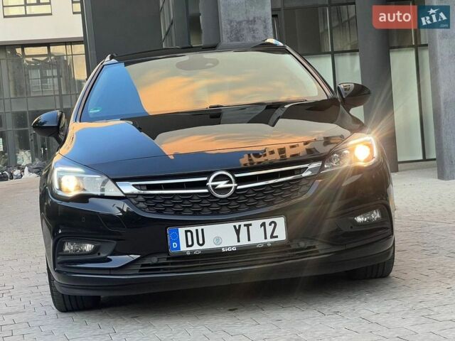 Черный Опель Астра, объемом двигателя 1.6 л и пробегом 205 тыс. км за 11550 $, фото 1 на Automoto.ua