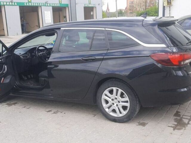 Черный Опель Астра, объемом двигателя 1.6 л и пробегом 260 тыс. км за 9900 $, фото 1 на Automoto.ua