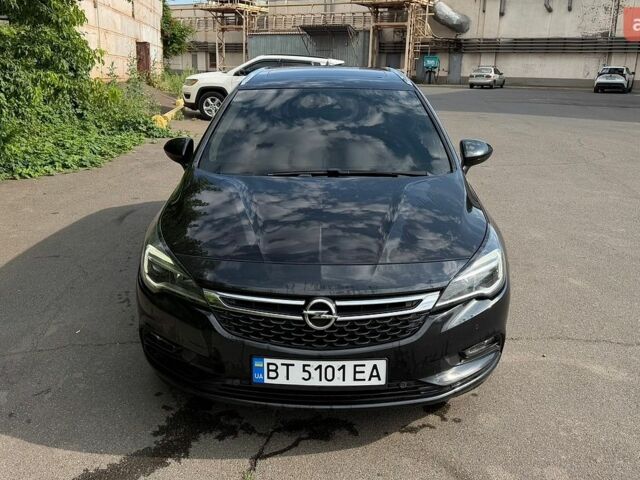 Черный Опель Астра, объемом двигателя 1.6 л и пробегом 240 тыс. км за 11800 $, фото 1 на Automoto.ua