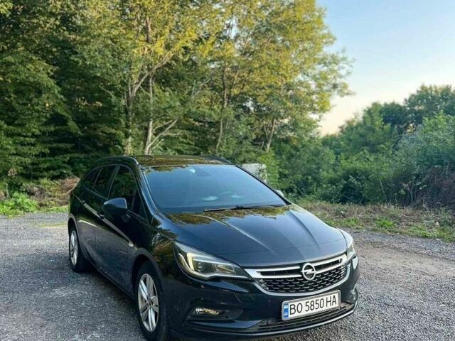 Черный Опель Астра, объемом двигателя 1.6 л и пробегом 254 тыс. км за 11500 $, фото 1 на Automoto.ua