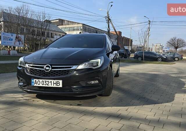 Черный Опель Астра, объемом двигателя 1.6 л и пробегом 230 тыс. км за 11200 $, фото 1 на Automoto.ua