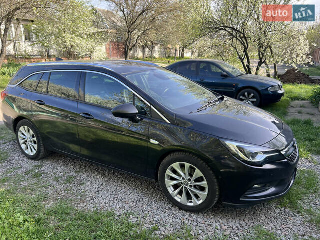 Черный Опель Астра, объемом двигателя 1.6 л и пробегом 318 тыс. км за 10400 $, фото 1 на Automoto.ua