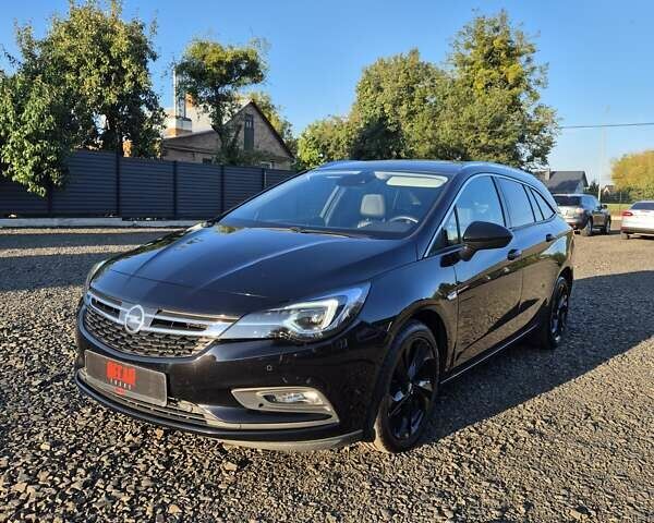 Черный Опель Астра, объемом двигателя 1.6 л и пробегом 194 тыс. км за 13500 $, фото 1 на Automoto.ua