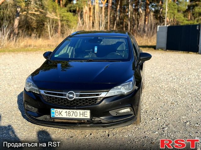 Черный Опель Астра, объемом двигателя 1.6 л и пробегом 200 тыс. км за 9500 $, фото 1 на Automoto.ua