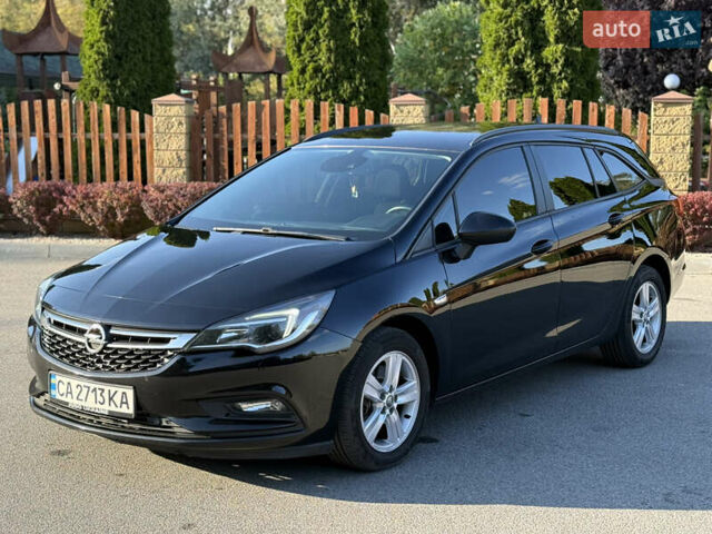 Черный Опель Астра, объемом двигателя 1.6 л и пробегом 173 тыс. км за 11500 $, фото 1 на Automoto.ua