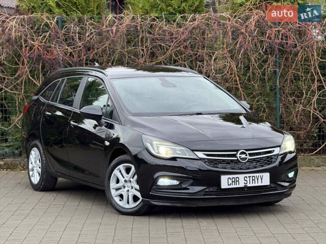 Чорний Опель Астра, об'ємом двигуна 1.6 л та пробігом 196 тис. км за 10999 $, фото 1 на Automoto.ua