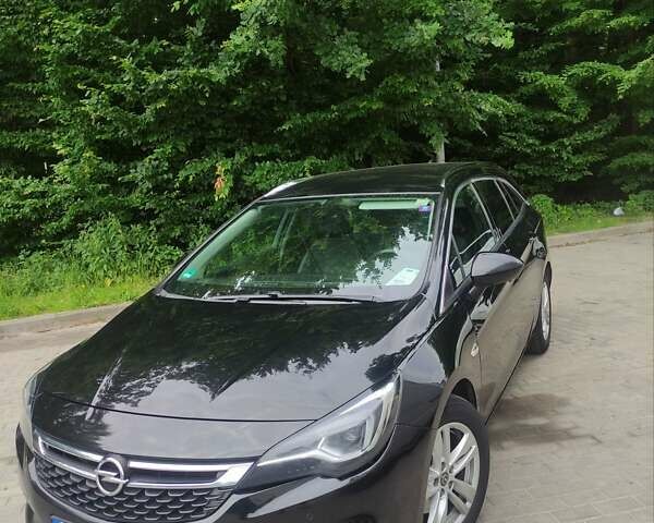 Черный Опель Астра, объемом двигателя 1.6 л и пробегом 295 тыс. км за 11400 $, фото 1 на Automoto.ua