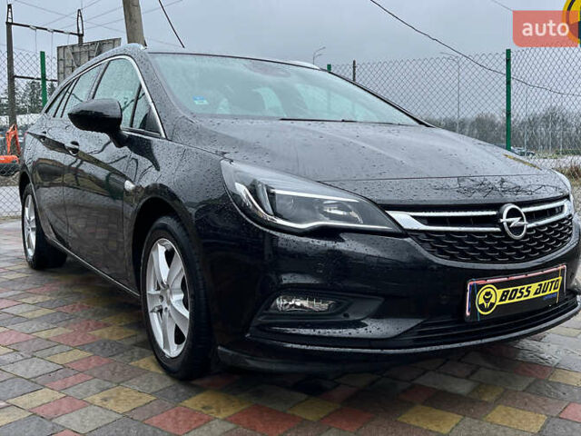 Черный Опель Астра, объемом двигателя 1.6 л и пробегом 199 тыс. км за 11700 $, фото 1 на Automoto.ua
