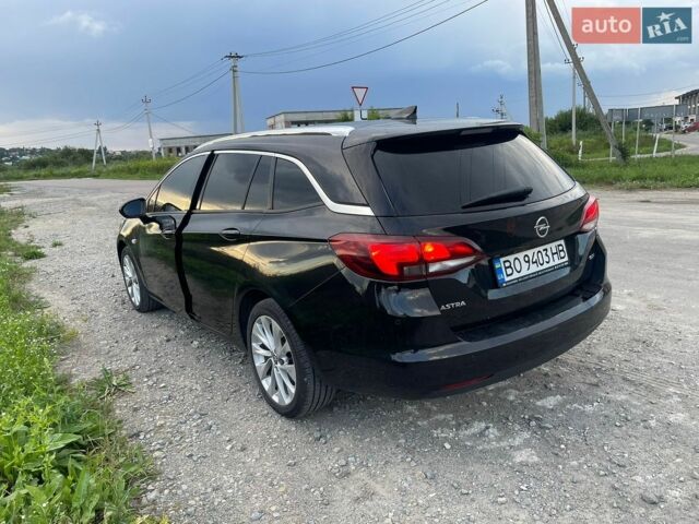Черный Опель Астра, объемом двигателя 1.6 л и пробегом 214 тыс. км за 10750 $, фото 1 на Automoto.ua
