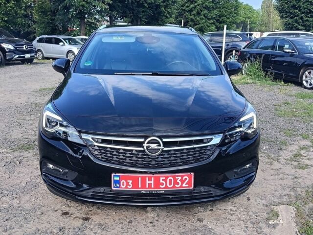 Черный Опель Астра, объемом двигателя 1.6 л и пробегом 160 тыс. км за 9700 $, фото 1 на Automoto.ua