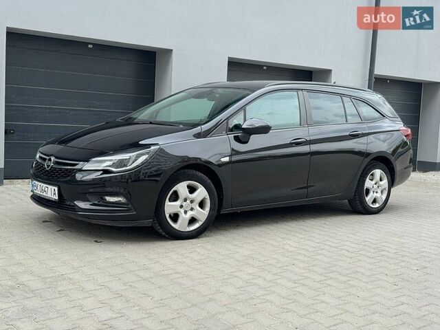 Черный Опель Астра, объемом двигателя 1.6 л и пробегом 211 тыс. км за 9700 $, фото 1 на Automoto.ua